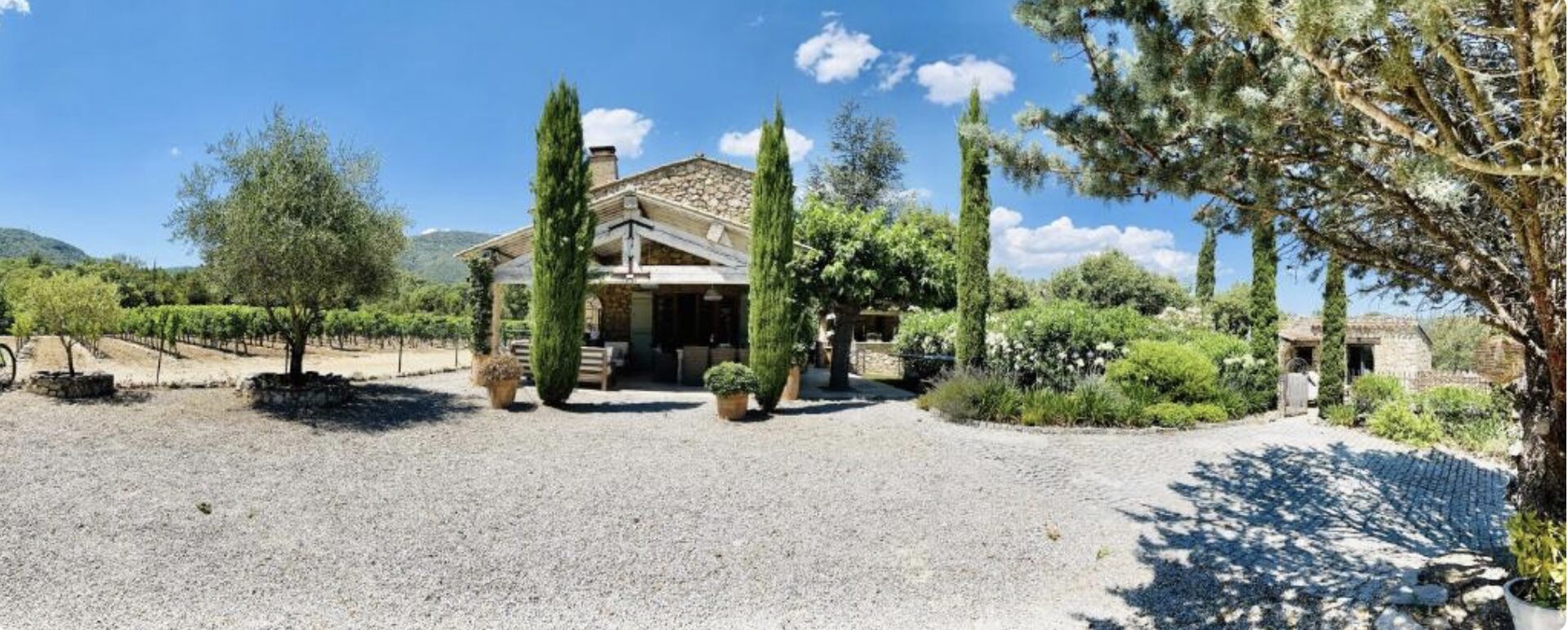 Bastide exterior with cypress trees